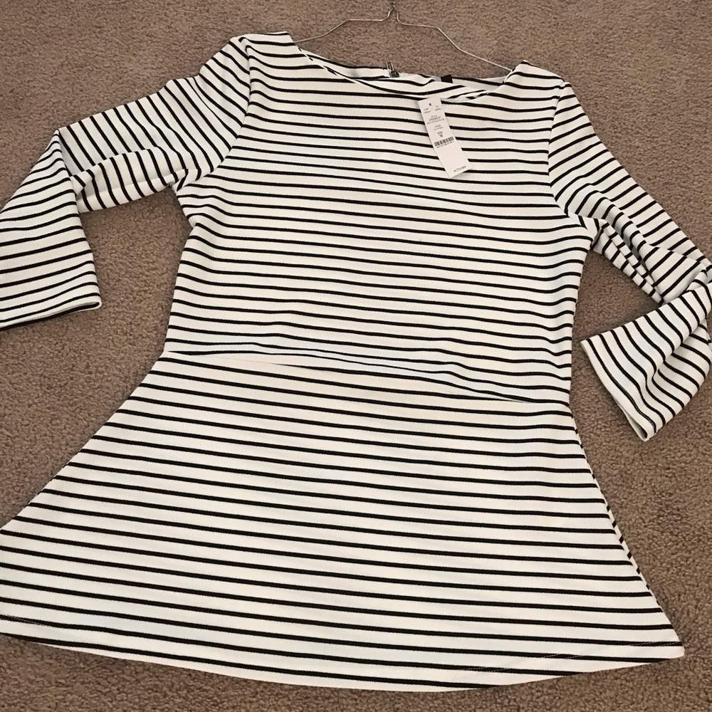 Asymmetrical striped peplum top